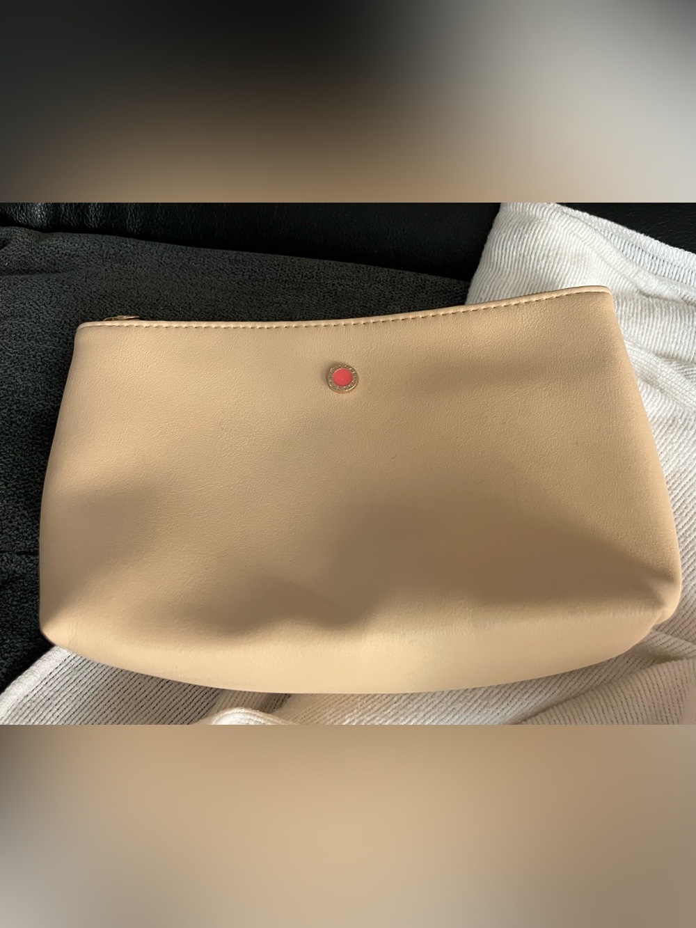 Bulgari Beige Cosmetic Pouch with Coral Accent. Small color transfer very light